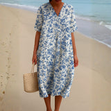 Magnolia - Vestido de Marfil Adornado con Acentos Florales en Azul Porcelana
