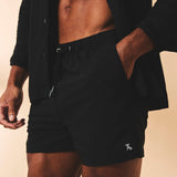 Shorts de baño lisos de secado rápido en negro