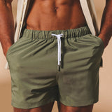 Shorts de baño lisos de secado rápido en caqui