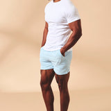 Shorts de baño lisos de secado rápido en azul claro