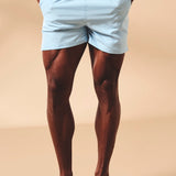 Shorts de baño lisos de secado rápido en azul claro