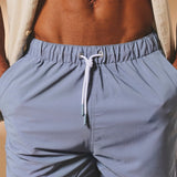 Pantalones de baño lisos de secado rápido en azul suave