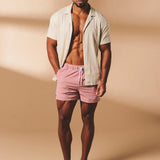 Shorts de baño lisos de secado rápido en rosa apagado