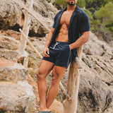 Shorts de baño de secado rápido con ribete en azul marino