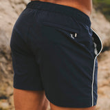 Shorts de baño de secado rápido con ribete en azul marino