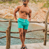 Shorts de baño lisos de secado rápido en Aqua